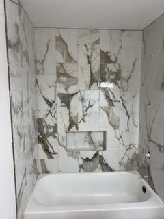 Finished marble tile shower